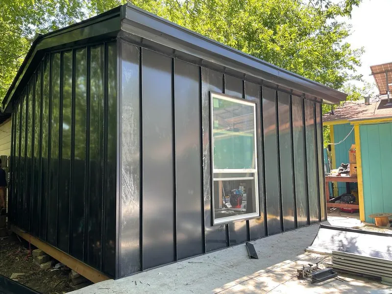 Black standing seam metal wall panels for Metal Roof Installation in Parma