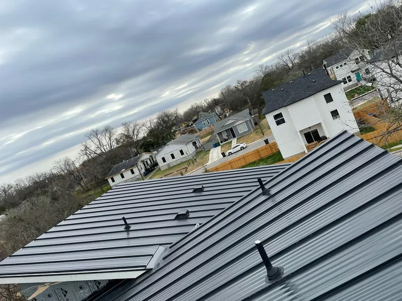 Standing seam metal roof panels with vents for Skylight Repair in Parma